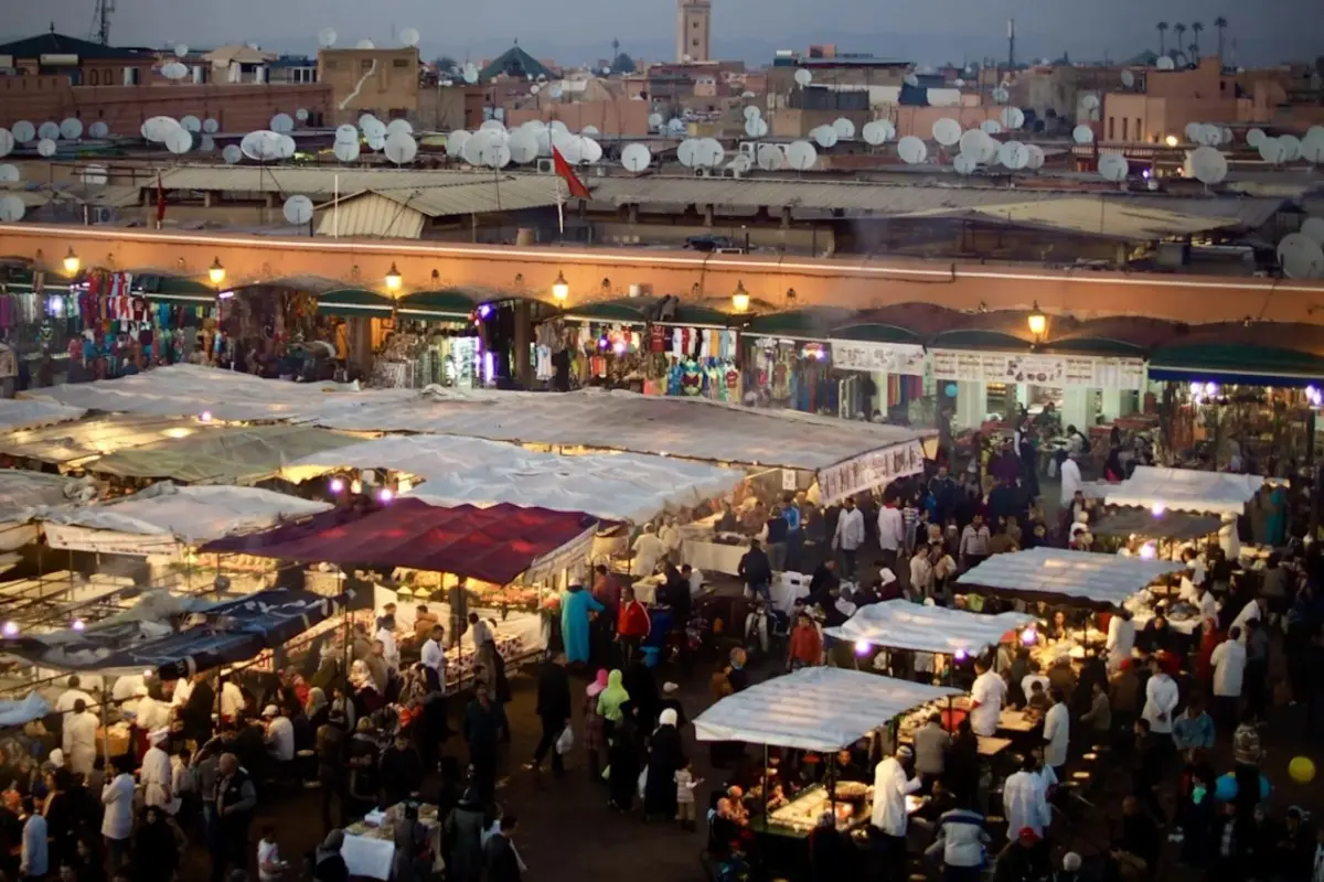 Bustling evening market in Marrakech Morocco showing affordable North African travel experiences